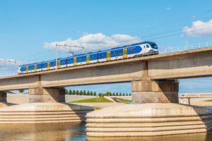 hrc-projects-dutch passenger train passing a bridge
